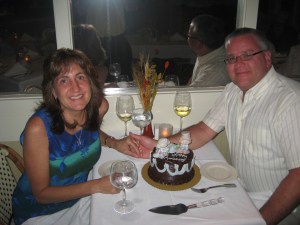 Barbara and David Thompson celebrating their 25th wedding anniversary on Sanibel Island at Casa Ybel's Thistle Lodge Beachfront Restaurant